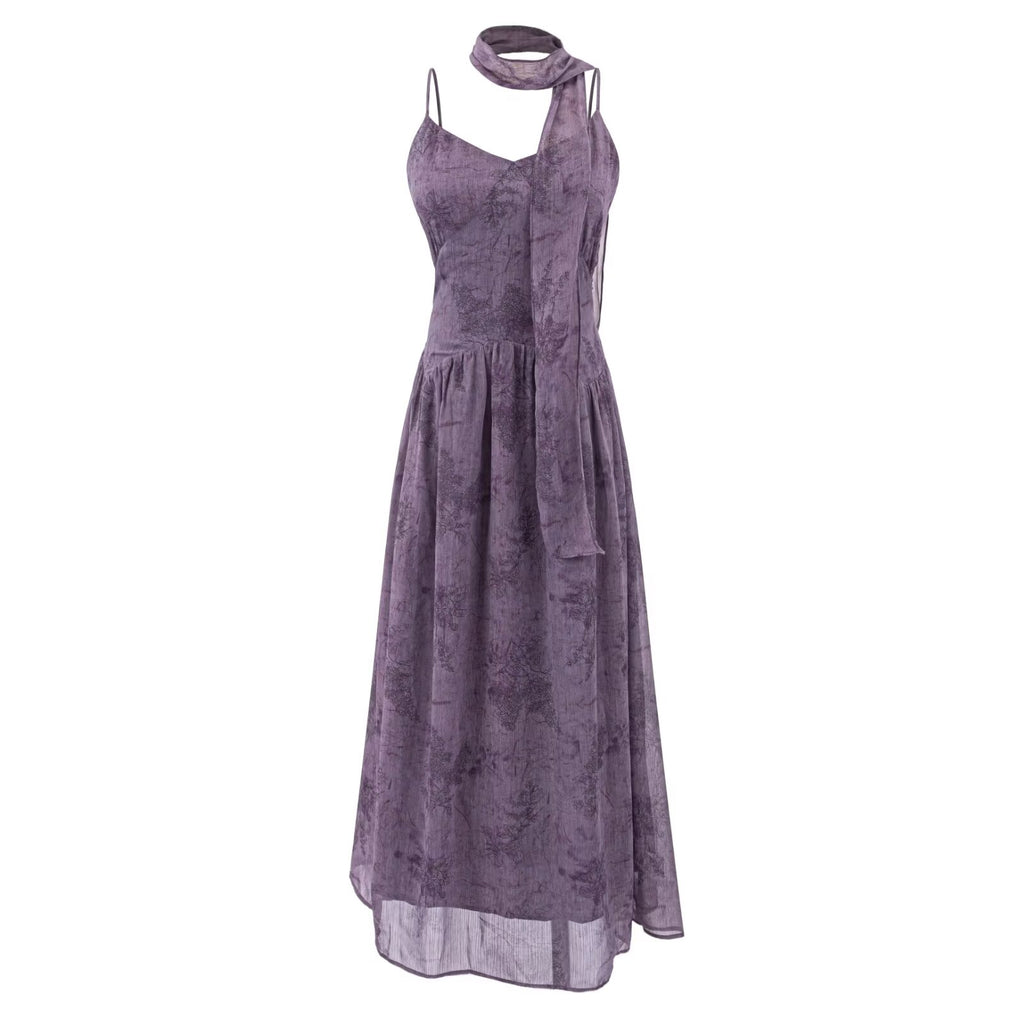 Purple maxi summer dress with spaghetti straps and draped square neckline, gathered waist, flared skirt.