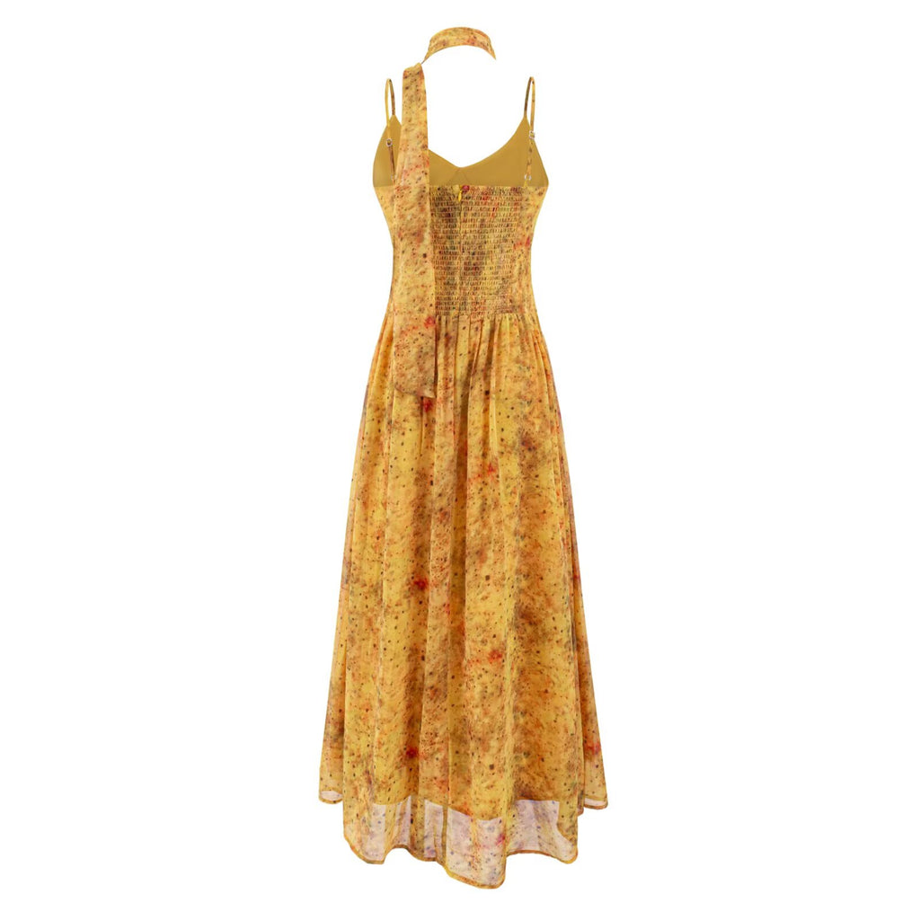 Yellow maxi summer dress with spaghetti straps and gathered waist, flared skirt.
