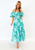 Green chiffon summer dress with off-shoulder neckline, puff sleeves, flowing tiered silhouette