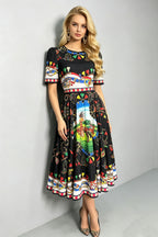Black short-sleeve midi dress with colorful scene print and patterned hem trim