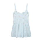 Light blue floral slip dress with spaghetti straps and pleated skirt