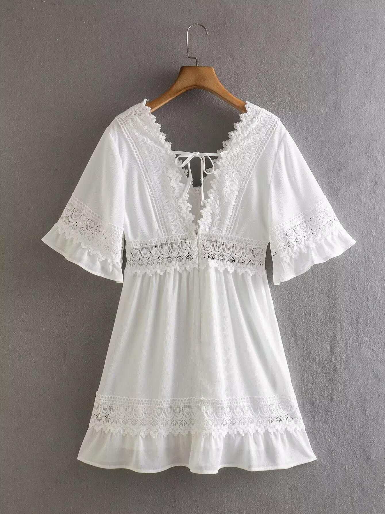 White summer dress with lace trim yoke, short bell sleeves, tiered skirt