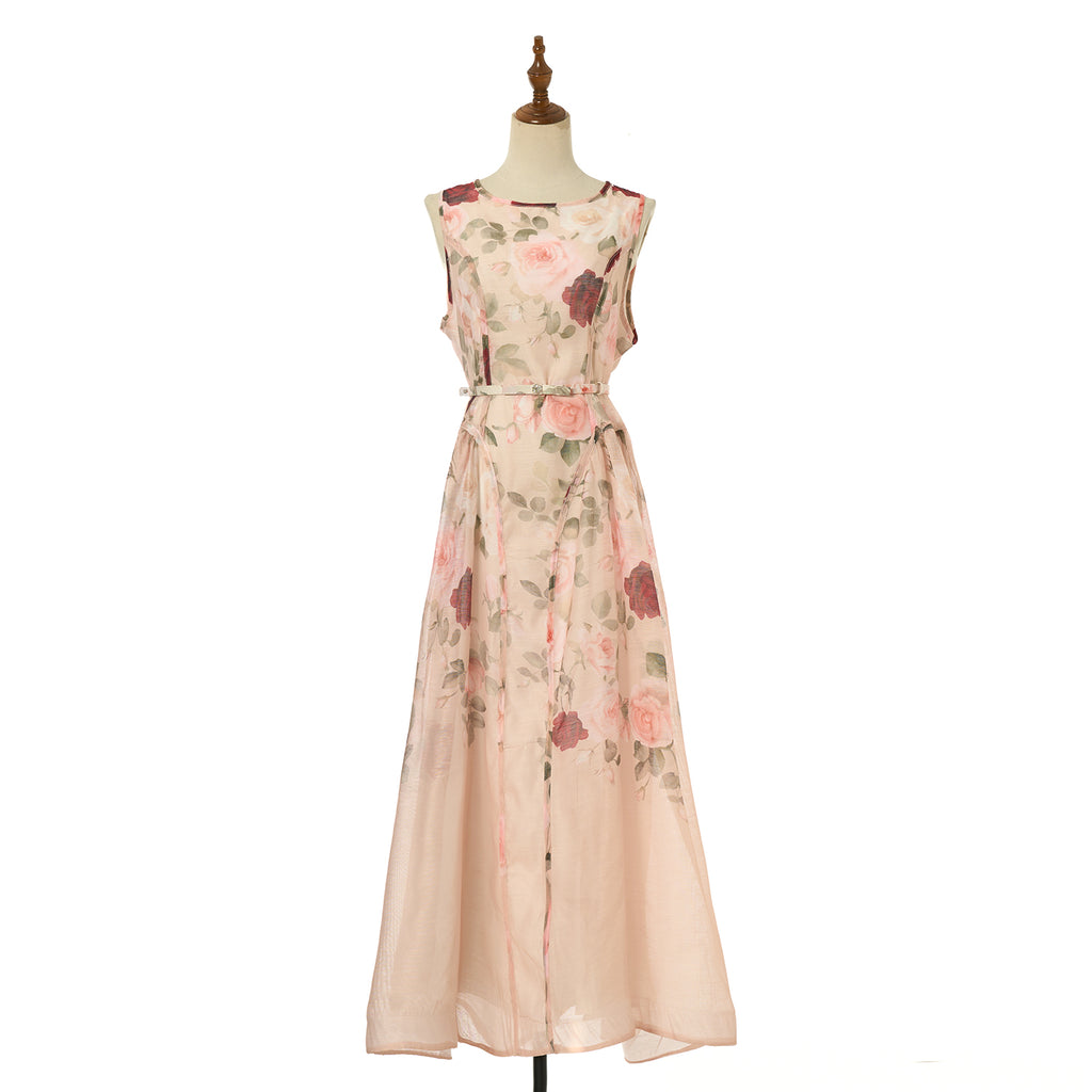 Floral sleeveless midi dress in light blush with fitted waist and tiered skirt