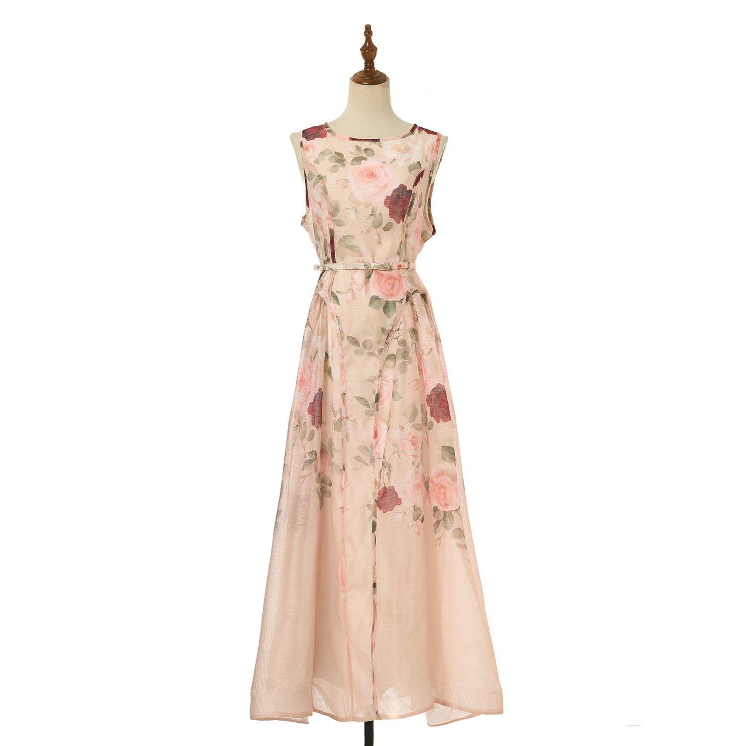 Floral sleeveless midi dress in light blush with fitted waist and tiered skirt