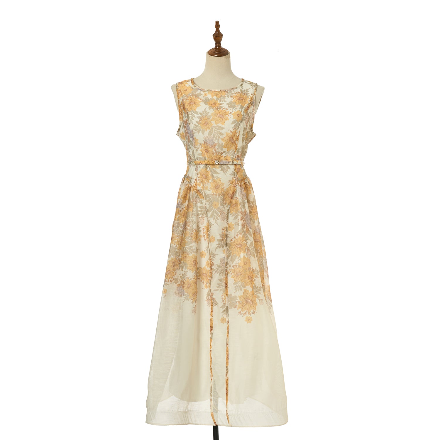 Floral sleeveless midi dress in light gold with fitted bodice and flowy skirt