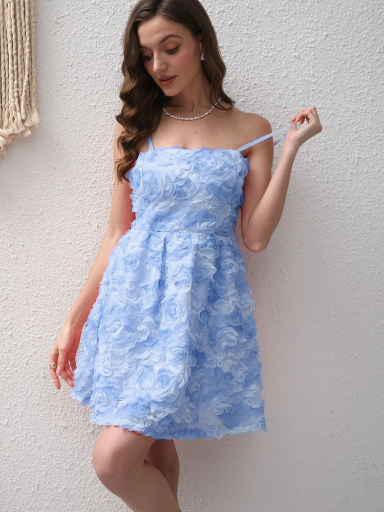 Powder-blue ruffled mini summer dress with spaghetti straps and fitted bodice.