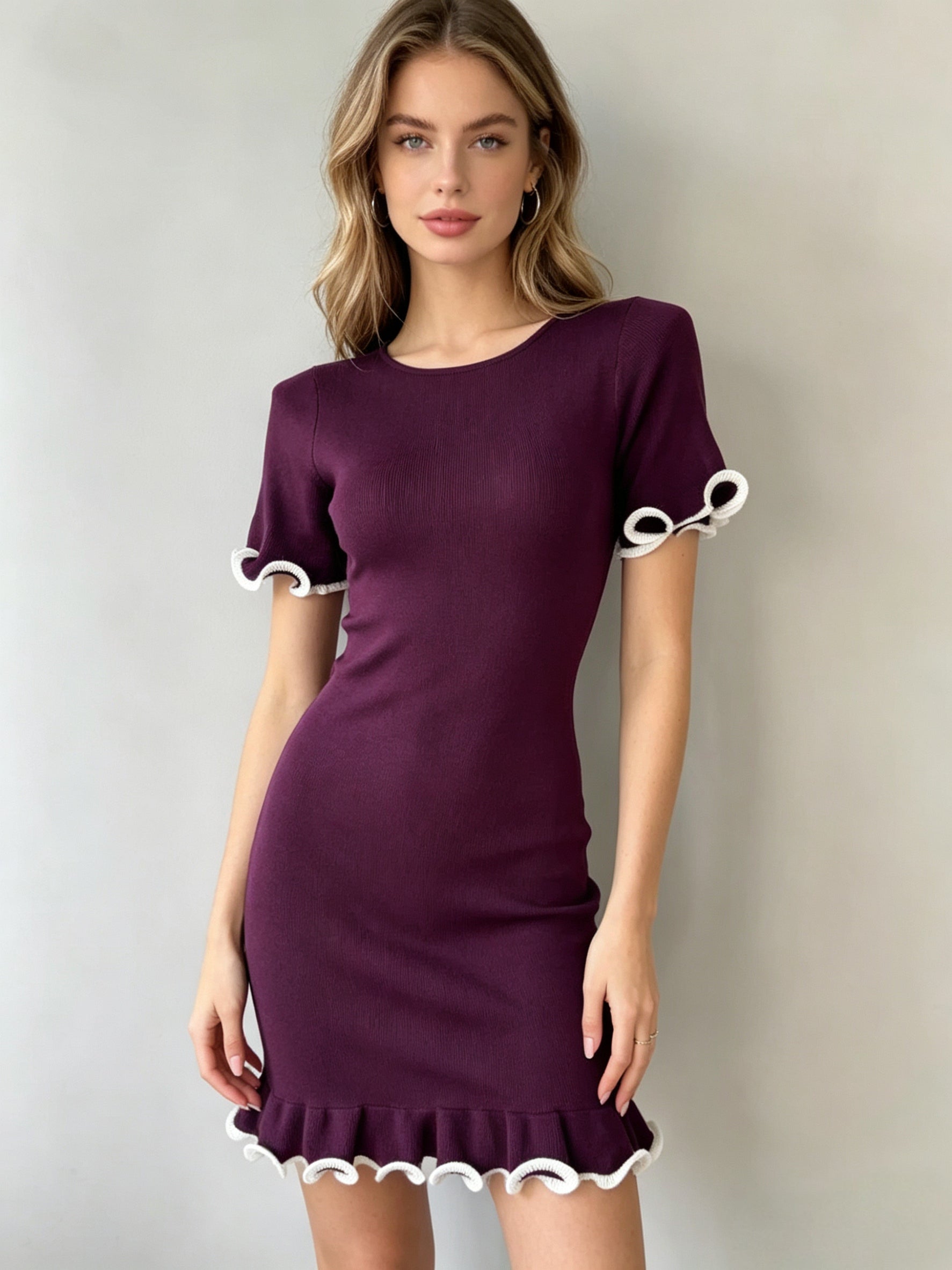 Plum women's knit ruffled dress with short sleeves and scalloped ruffle hem