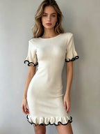 Ivory women's knit ruffled dress with short sleeves and scalloped ruffle hem