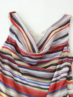 V-neckline detail of multicolor striped sleeveless dress with draped fabric