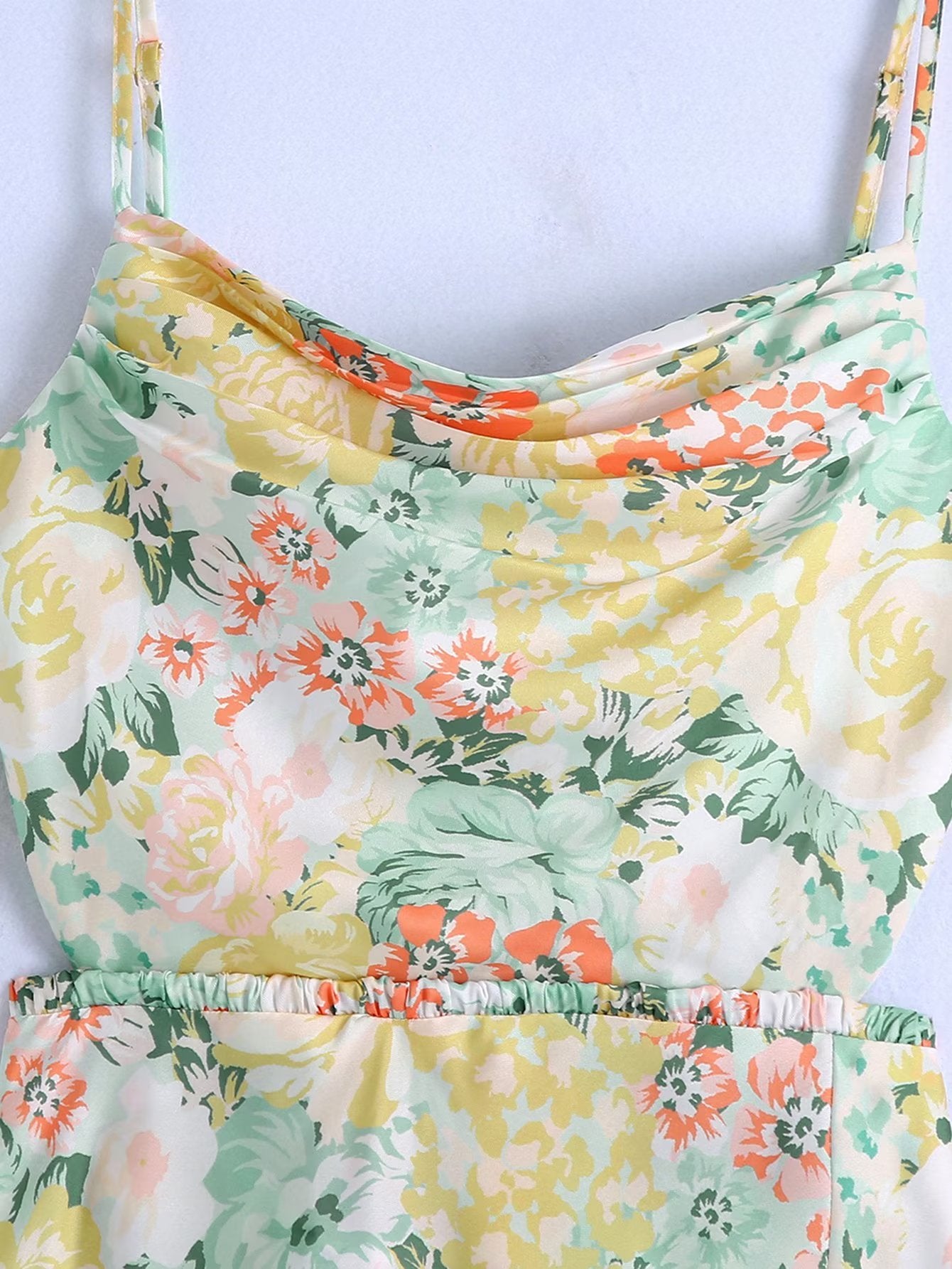 Floral bodice with wide scooped neckline and gathered waist
