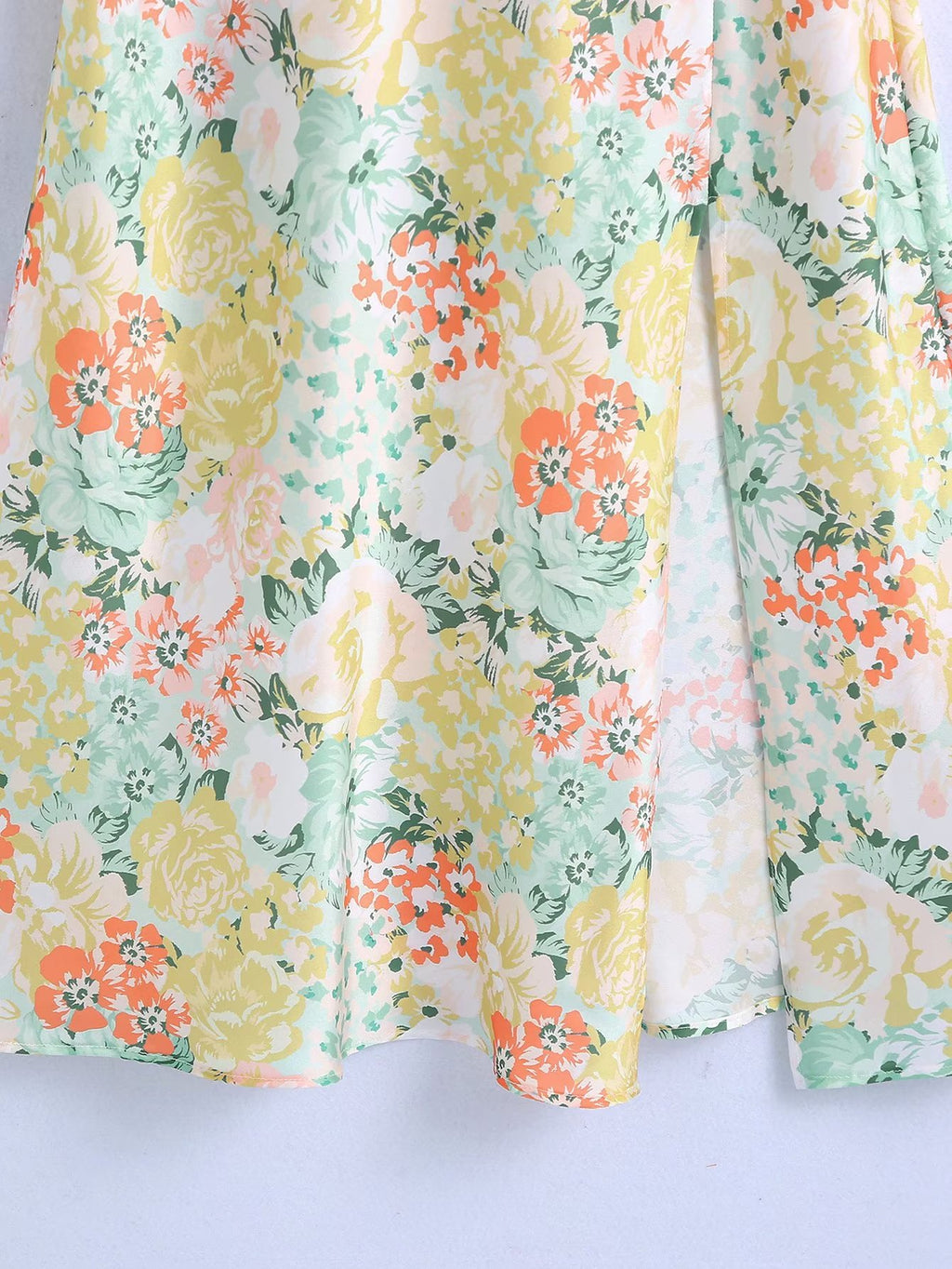 Floral maxi dress skirt with flowing hem and mixed pastel flowers