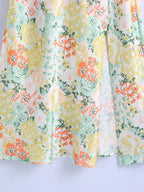 Floral maxi dress skirt with flowing hem and mixed pastel flowers