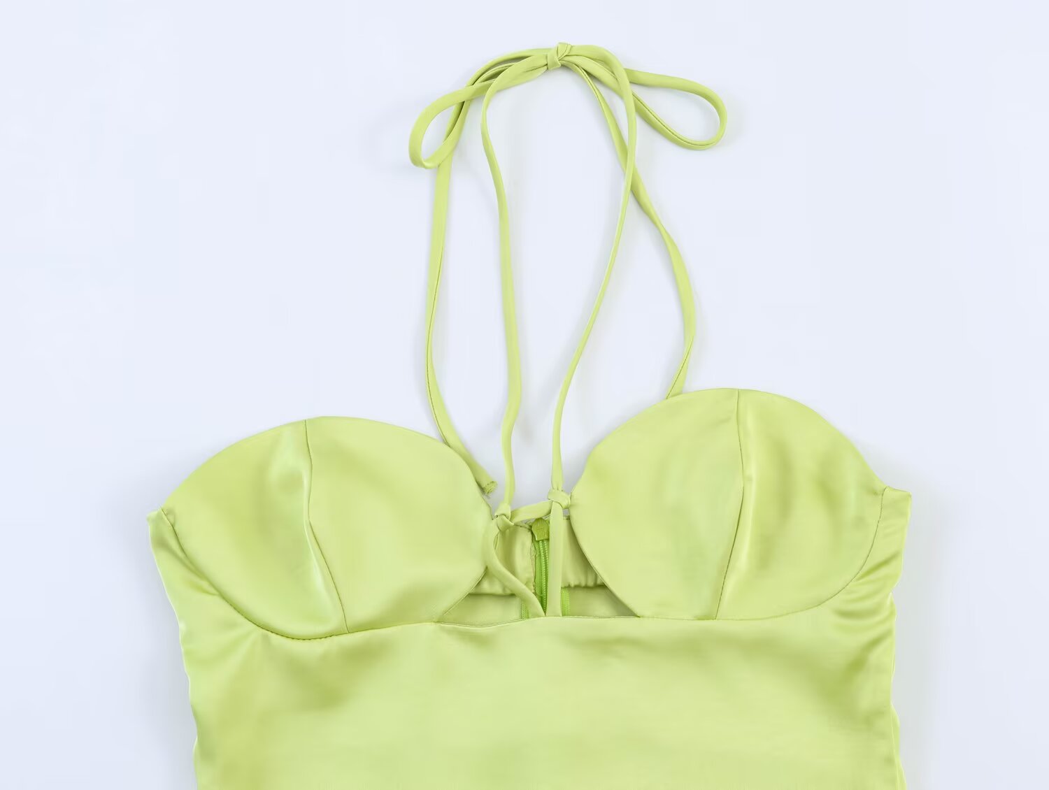 Green satin midi dress with spaghetti straps and ruched sweetheart neckline