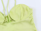 Green satin midi dress with ruffled neckline and gathered cap sleeves
