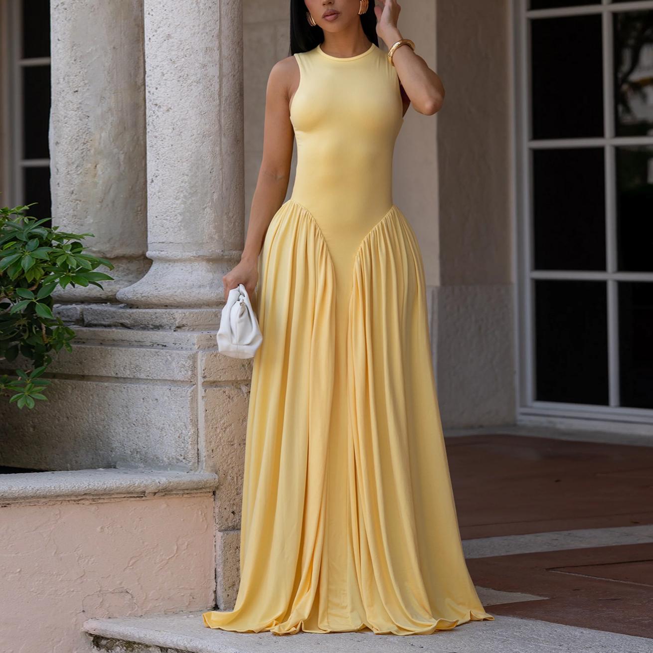 Yellow sleeveless dress with high neck and gathered A-line maxi skirt