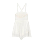 White mini summer dress with V-cross back straps and layered skirt with lace edging