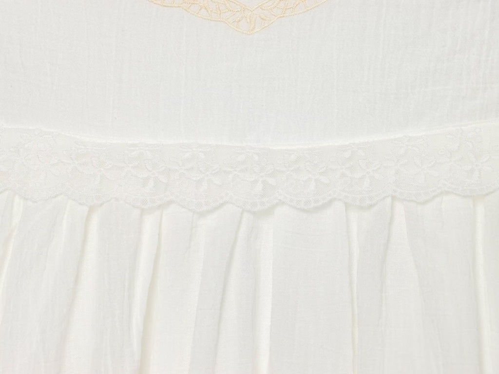 White mini summer dress tiered skirt with embroidered trim and ruffled waistline