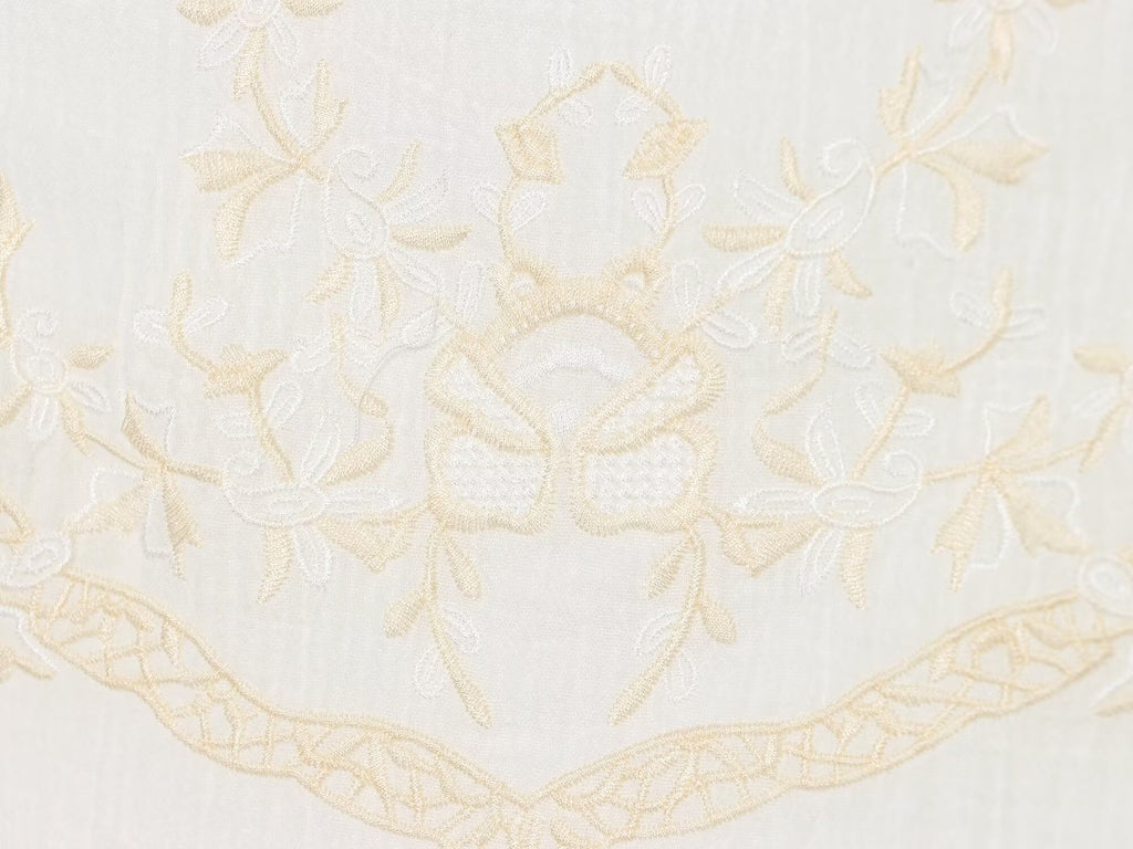 White mini summer dress fabric with floral embroidery and scalloped lace border