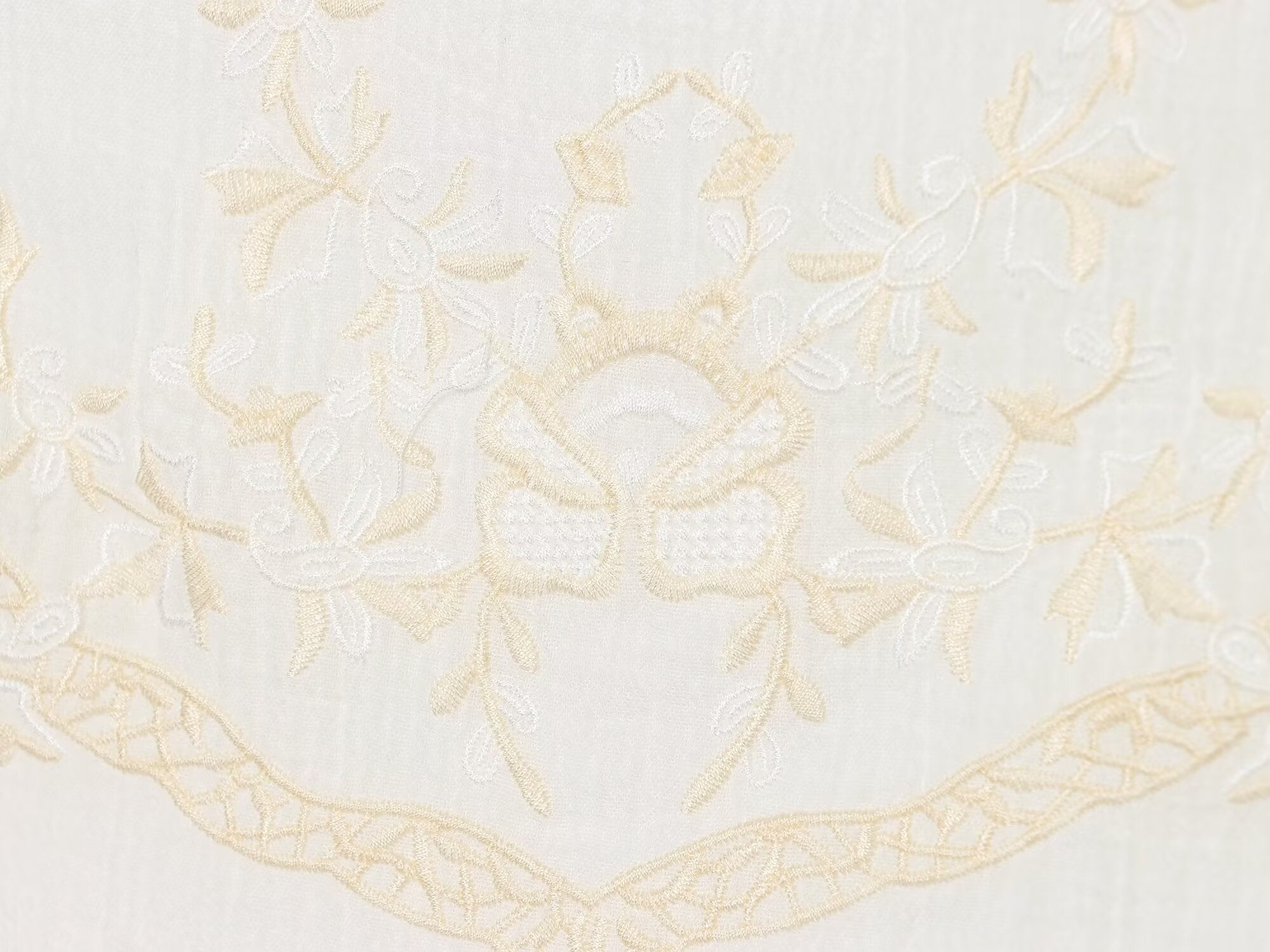White mini summer dress fabric with floral embroidery and scalloped lace border