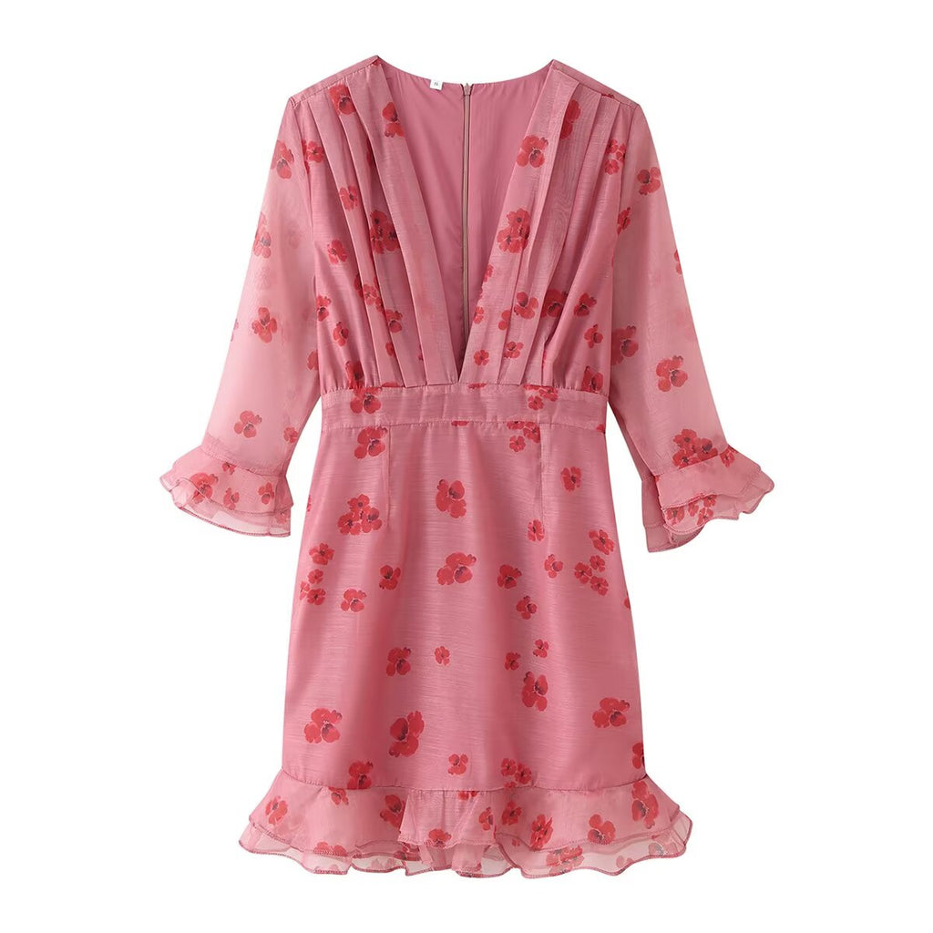 Pink ruffled summer dress with red floral print, gathered waist and tiered hem
