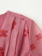 Pink dress yoke and pleated ruffled skirt with red floral print