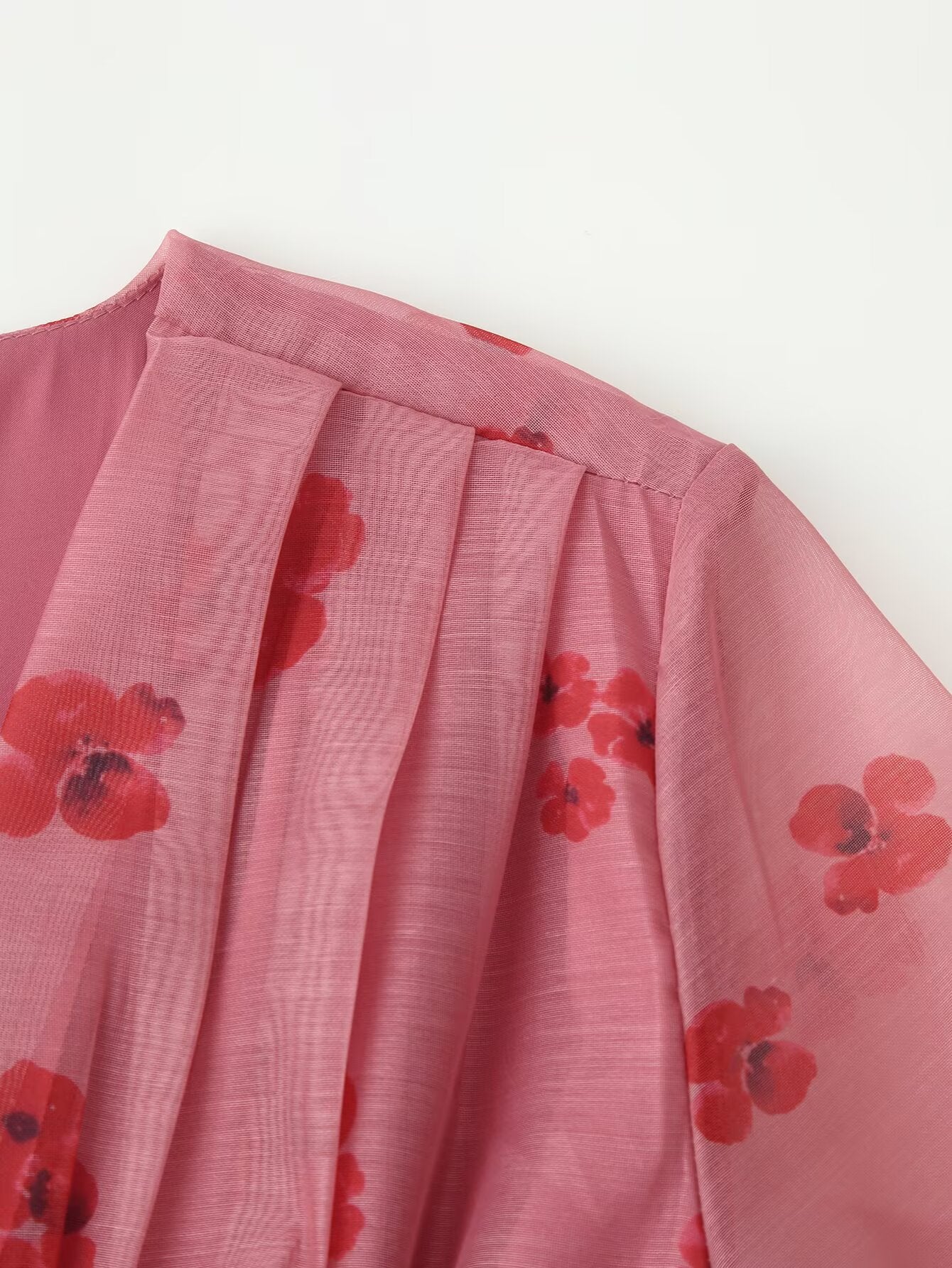 Pink dress yoke and pleated ruffled skirt with red floral print