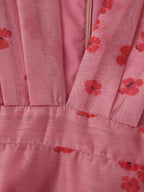 Pink floral dress close-up of skirt tiers and waistband seam