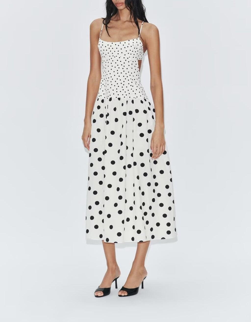 Polka dot cami slip dress with spaghetti straps, fitted bodice and midi skirt