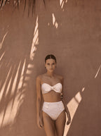 Bandeau bow swim top and high-waisted bikini bottoms, pale pink