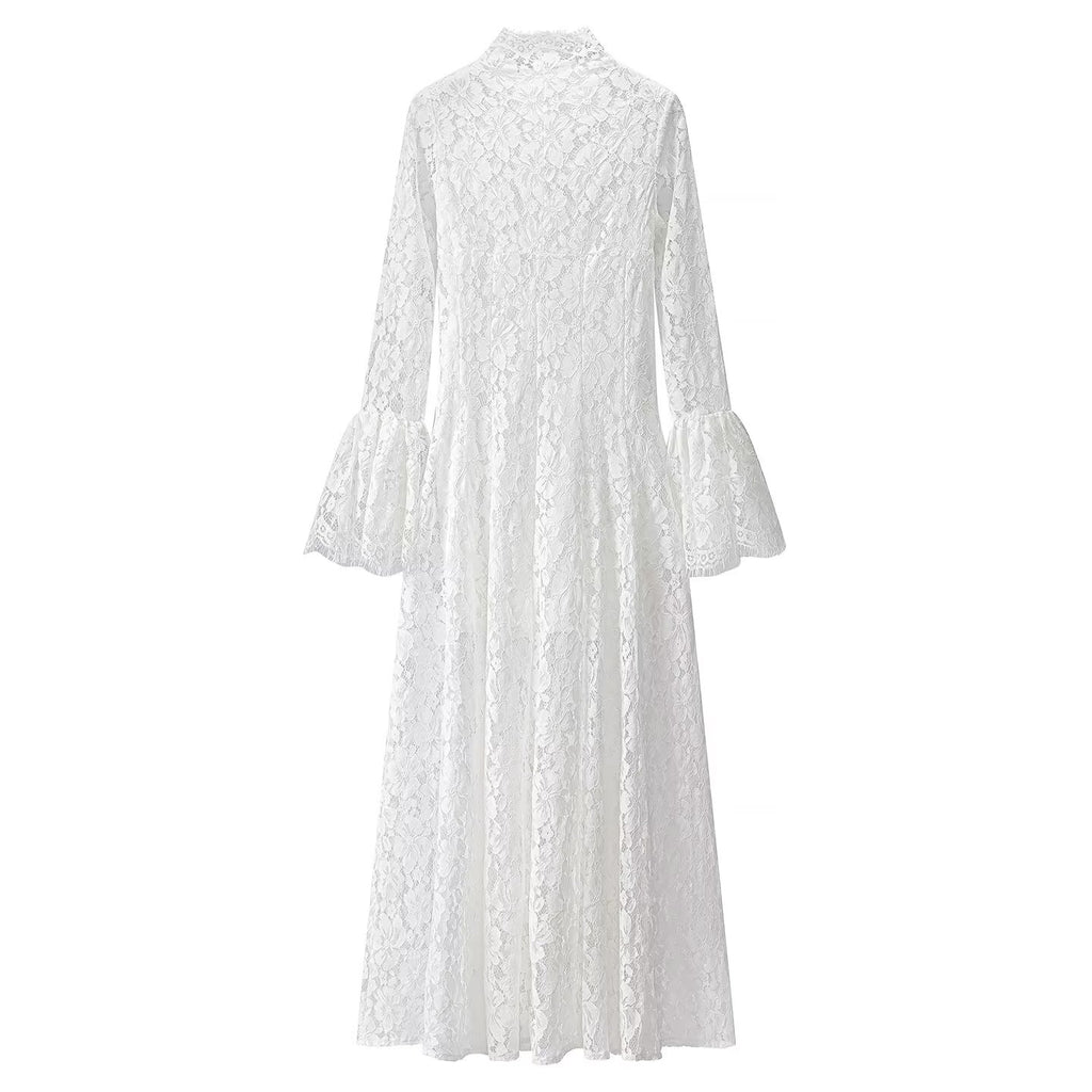 White lace maxi dress with high neck, long sleeves, and bell cuffs