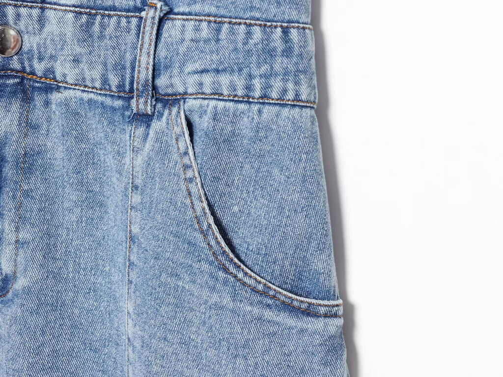 Blue denim mini dress waist with belt loops and stitched pocket detail