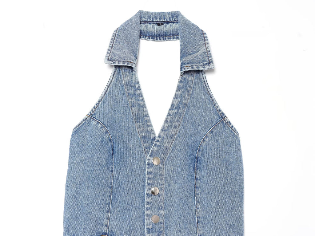 Blue denim halter mini dress with open V neckline and gold button placket