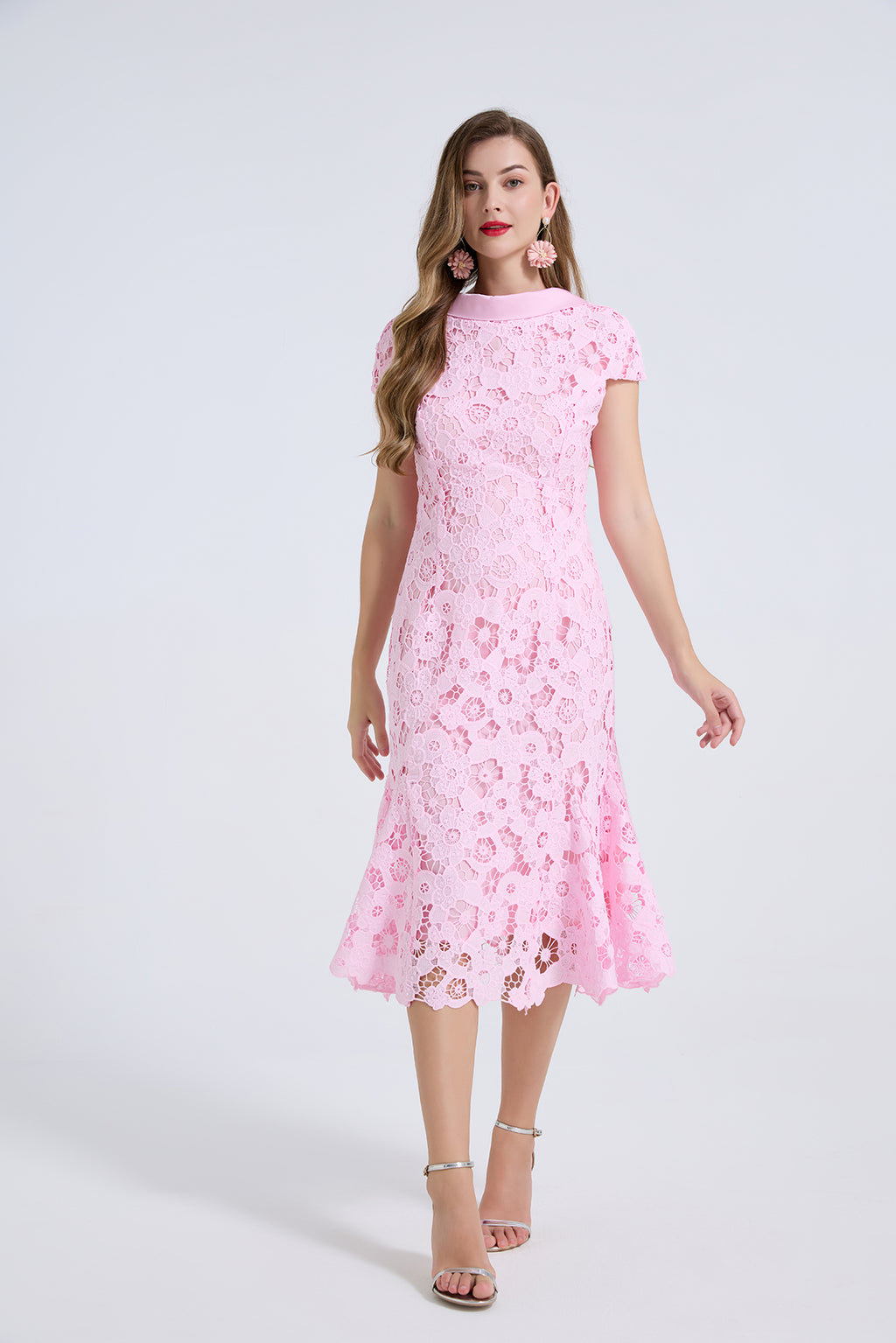 Pink lace knee-length dress, fitted bodice and flared skirt