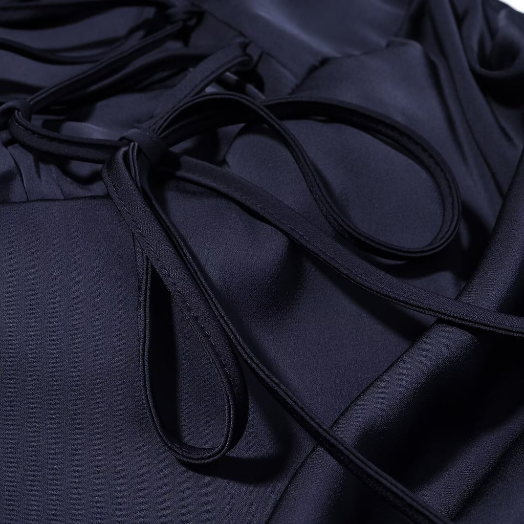 Navy blue dress with thin tie strings and ruched bodice edge detail