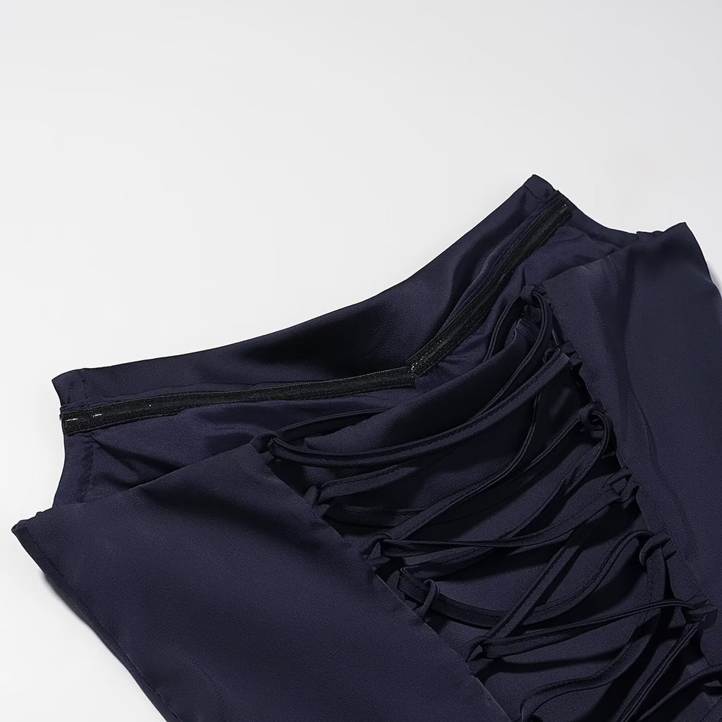 Navy blue dress neckline with gathered straps and ruched panel detail