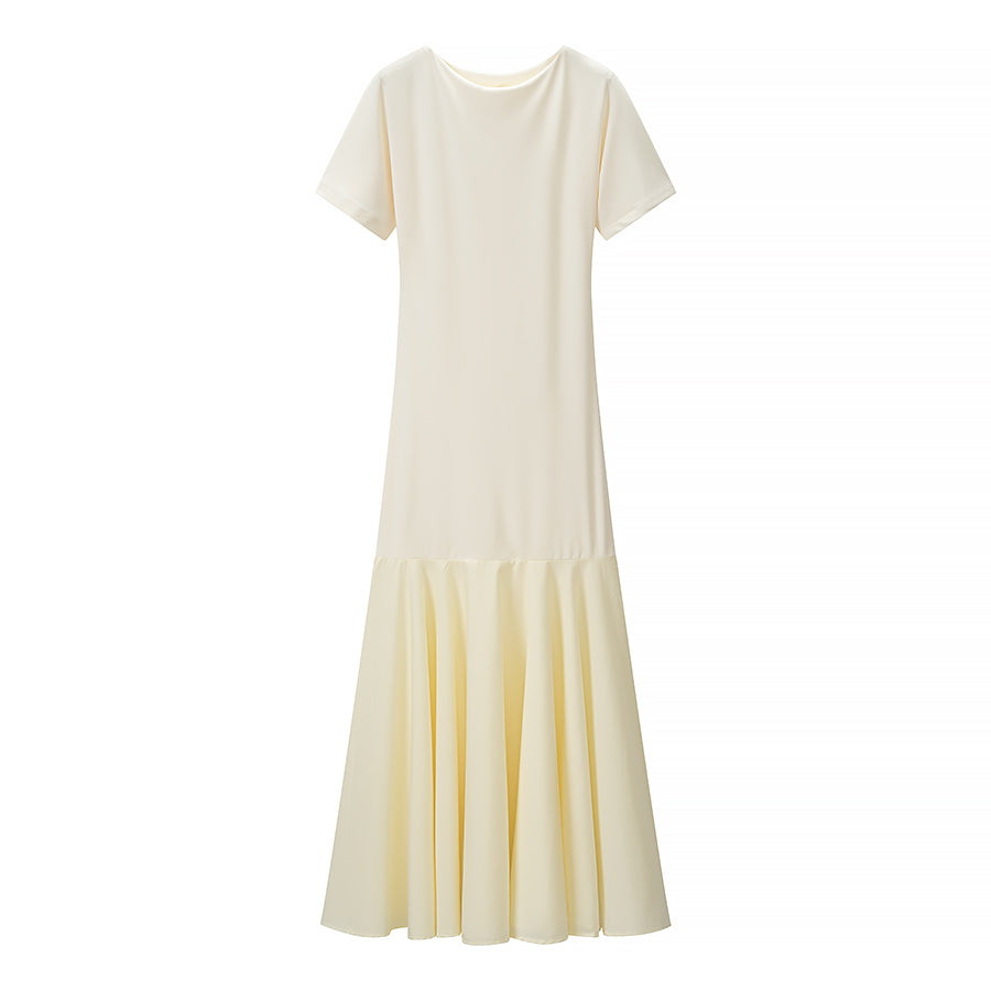 Light yellow women’s summer dress with short sleeves and pleated hem tier