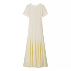 Light yellow women’s summer dress, crew neck and gathered tiered skirt
