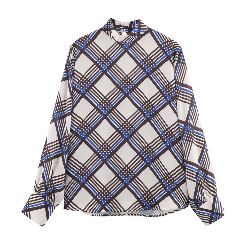 Multi plaid turtleneck top with long sleeves and mock neck