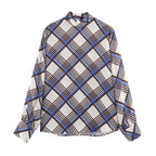 Multi plaid turtleneck top with long sleeves and mock neck