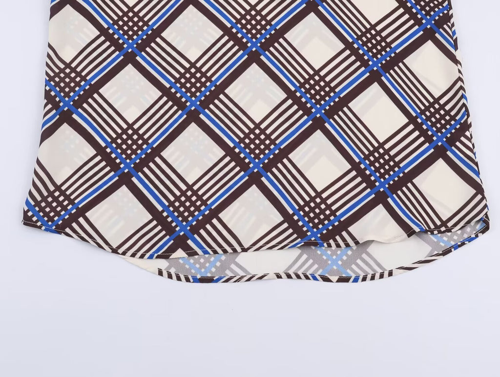 Plaid turtleneck shirt hem with multi-color check pattern