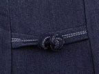 Deep blue denim button placket with twisted rope-button detail