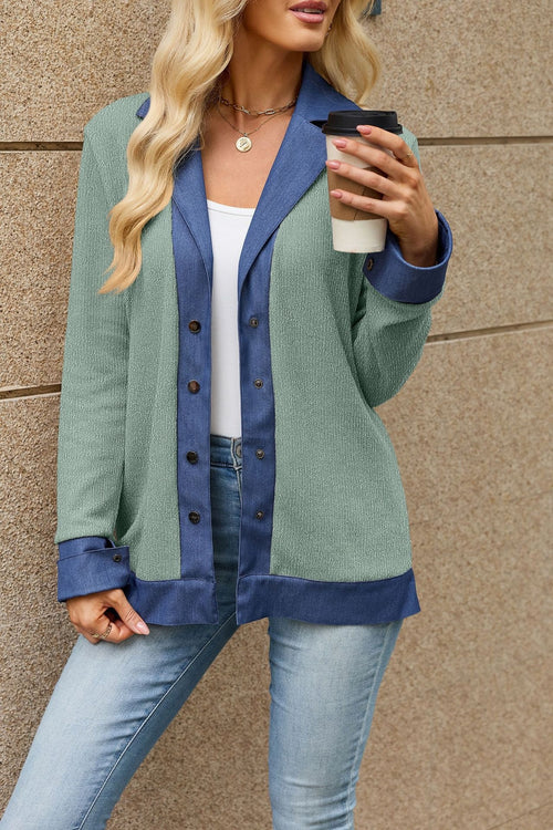 Green button-front long-sleeve sweater with blue contrast lapels and patch pockets