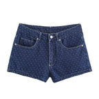 Blue polka dot denim shorts with front button and pockets
