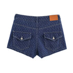 Blue polka dot denim shorts, rear with patch and belt loops