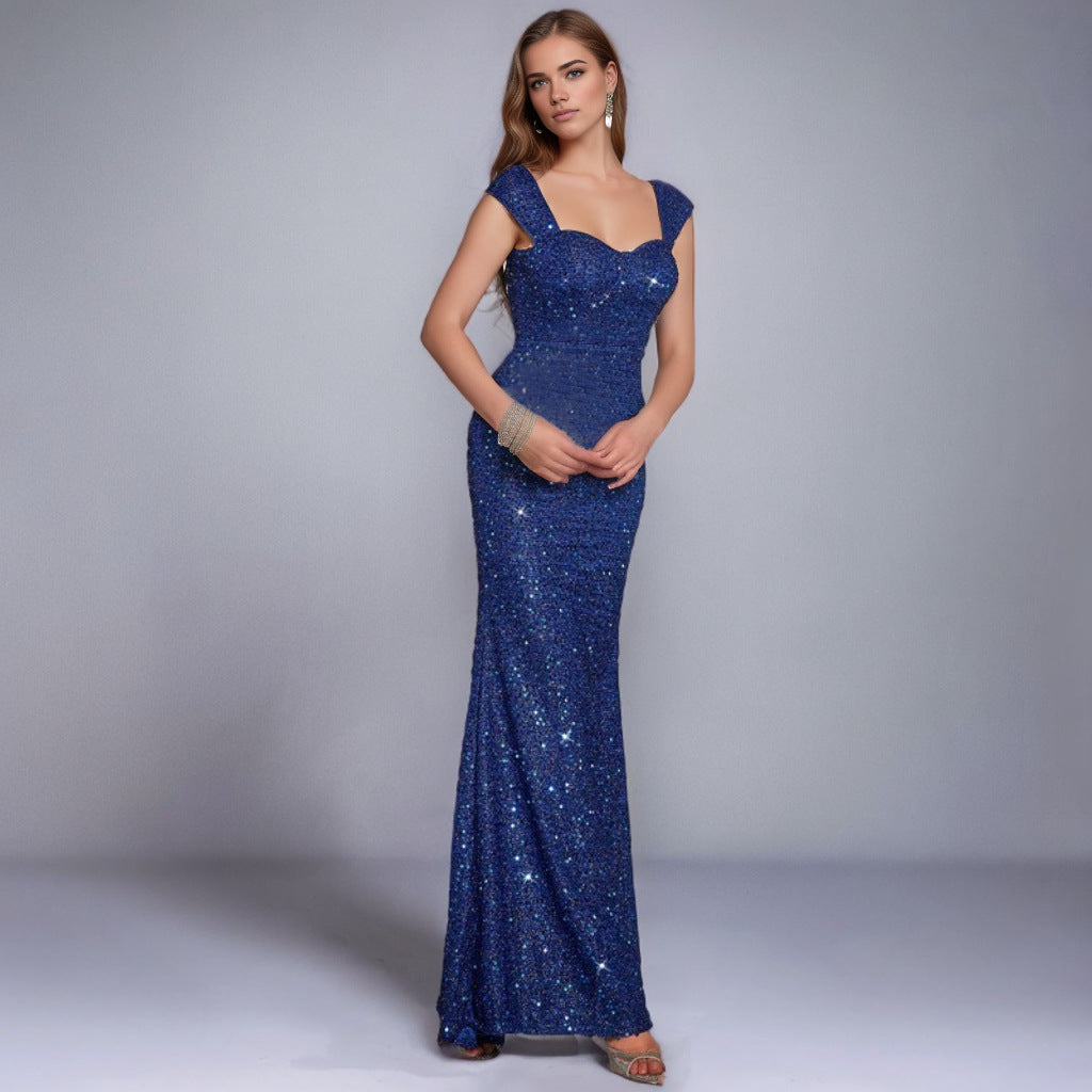 Dark blue sequin sling dress with sweetheart neckline and fitted mermaid silhouette