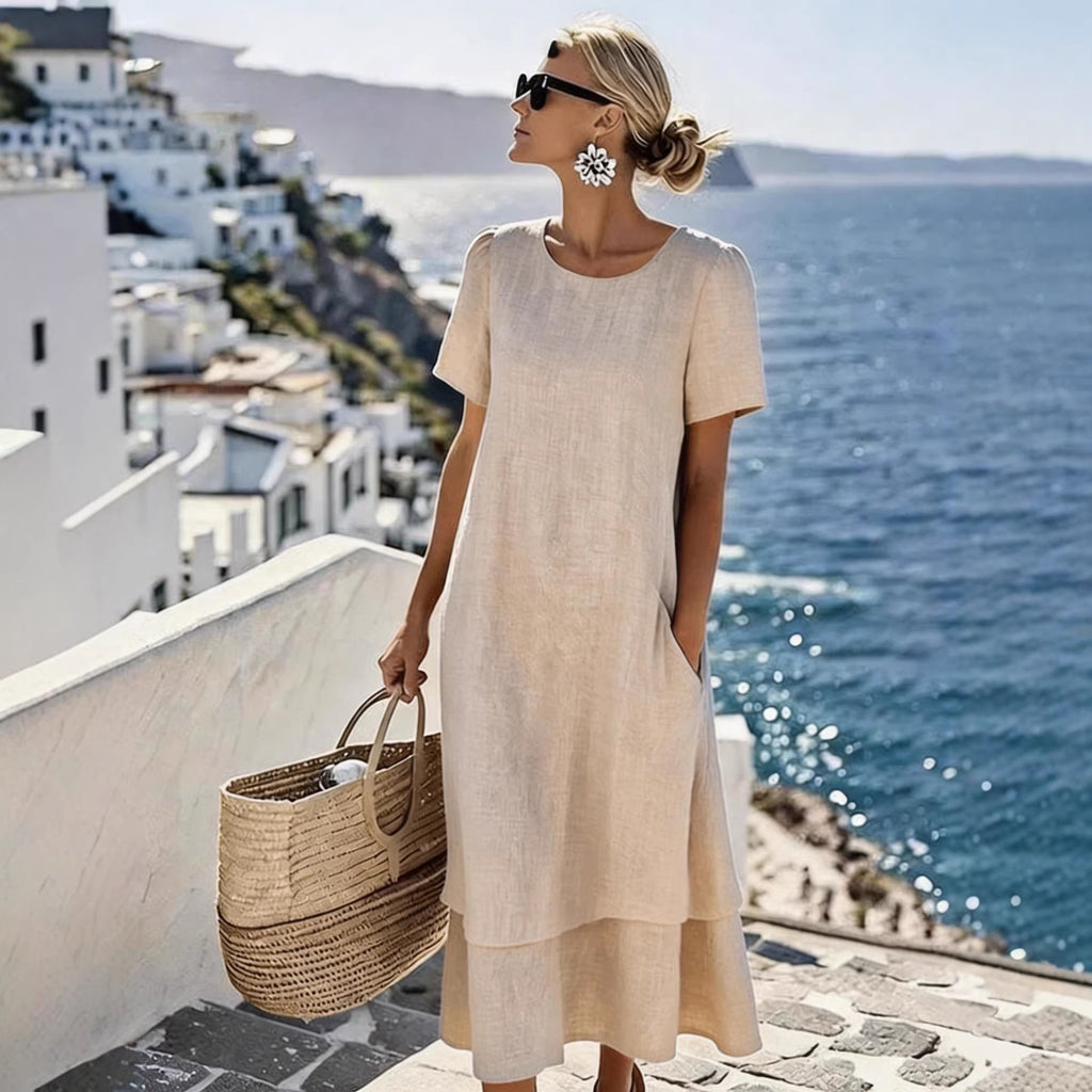 Beige boho short-sleeve dress with round neck, loose midi hem and layered skirt