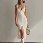 Beige ribbed sleeveless slit midi dress with slim fitted silhouette