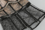 Black mesh bodice with silver sequins and crisscross strap detail