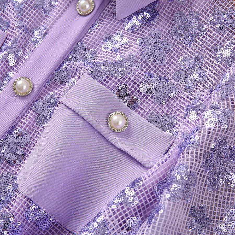 Close-up of lavender sequin dress with pearl-tone button closures on pocket panel