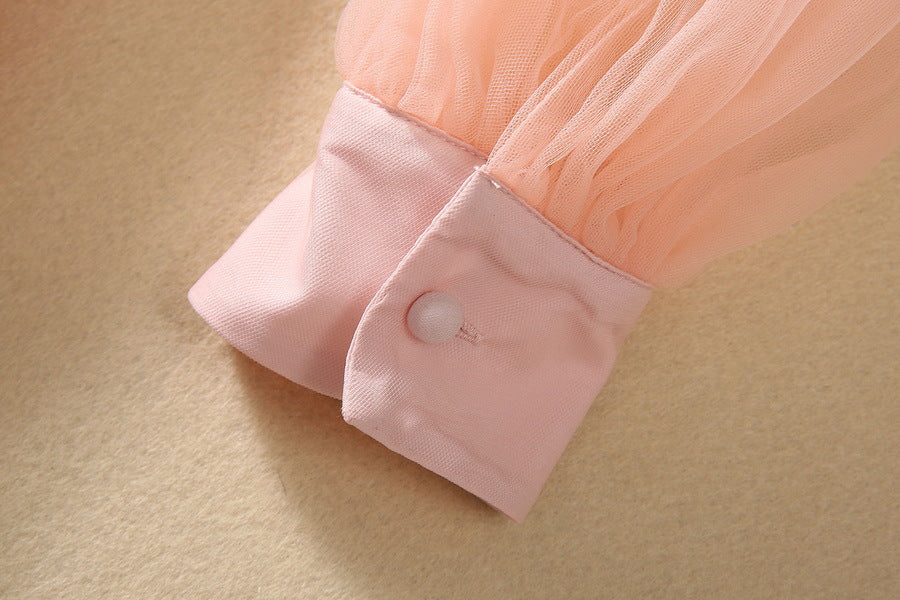 Pink sheer long sleeve cuff with small button detail
